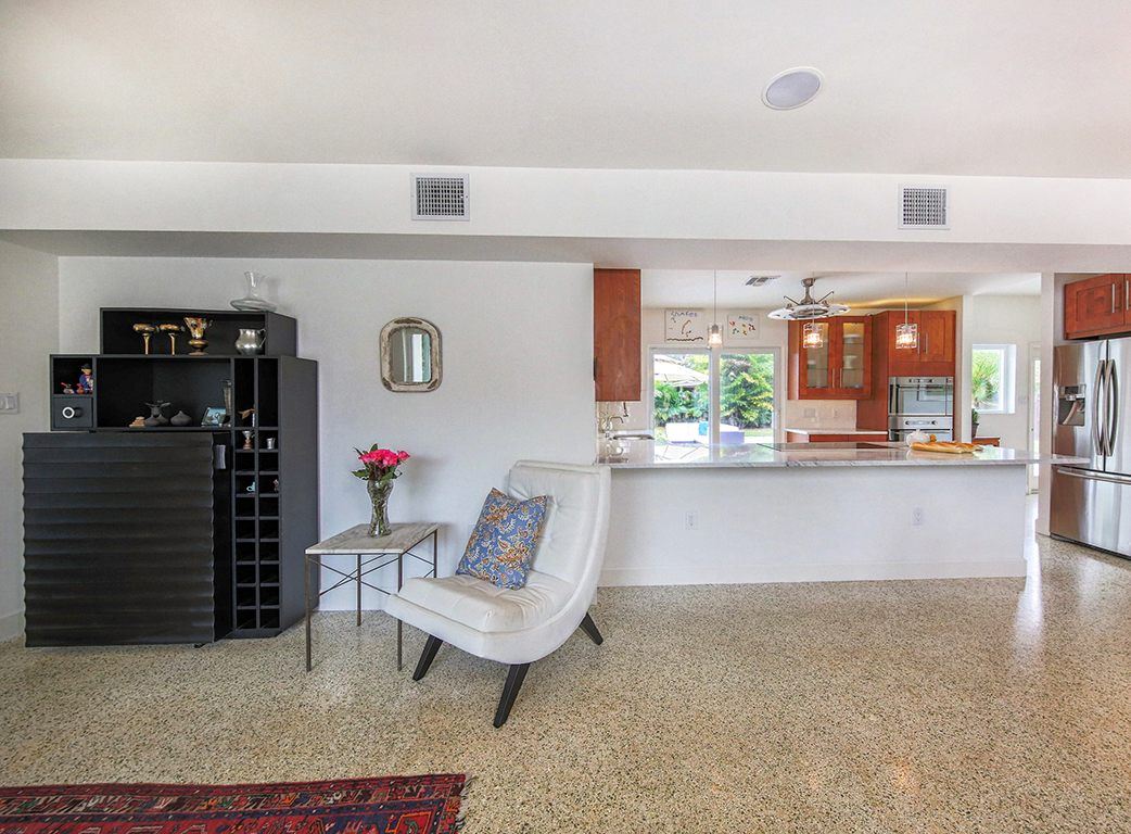 Living area opening onto the kitchen