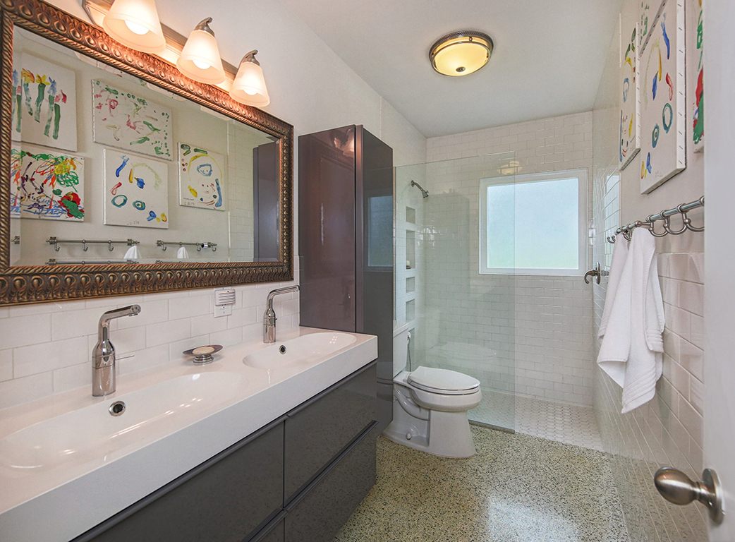 Bathroom with a double trough sink