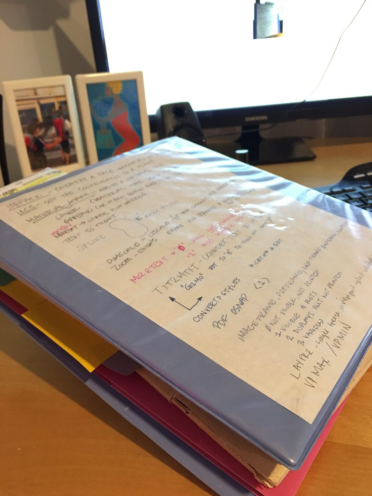 Photograph of a Notebook with handwritten AutoCAD Tips & Cheats