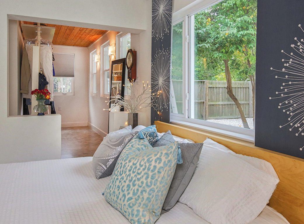 Bedroom with a wood-ceilinged alcove
